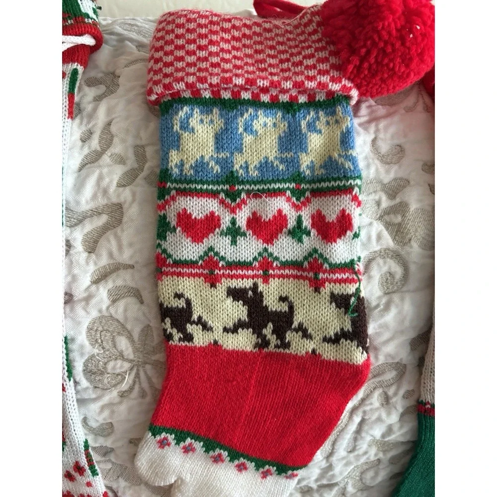 3 Vintage CHRISTMAS Stockings knit Dog, Santa/Carolers/Toys Merry Christmas 1960